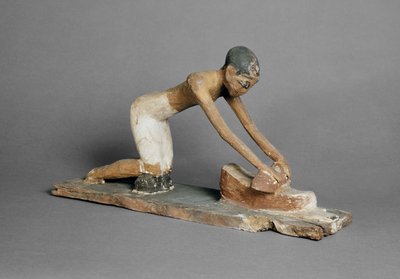 Model of a woman grinding corn, Egyptian, found at Sidmant by Egyptian 6th Dynasty